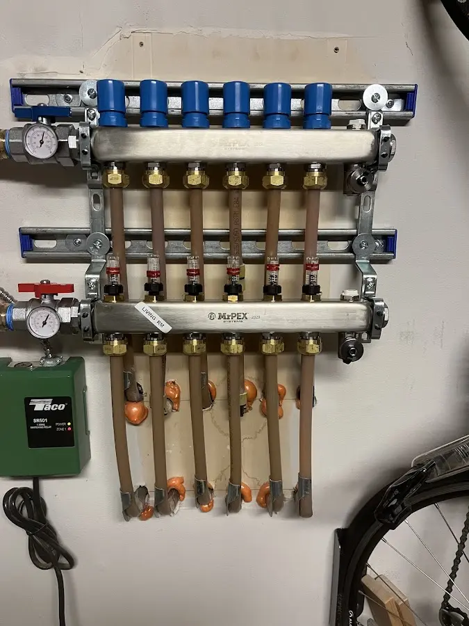 Plumber performing Water Heater Repair at a residential property in Upper Makefield